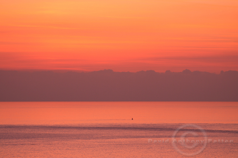 Photo on Canvas of Sunset over Tusker Bouy from Ogmore by Sea Wales