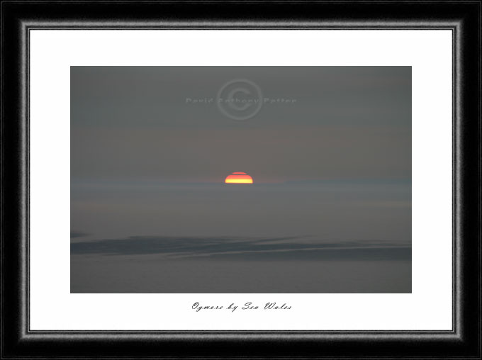 photo of setting sun over ogmore by david anthony batten