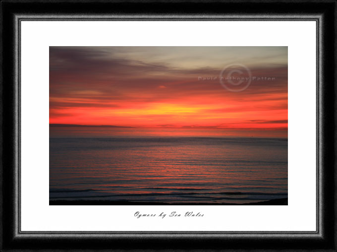 Deep Red Photos of Sunsets at Ogmore by Sea Wales by David Anthony Batten