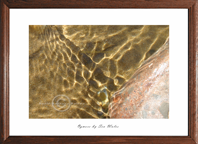 orange pebble photo at ogmore by david anthony batten