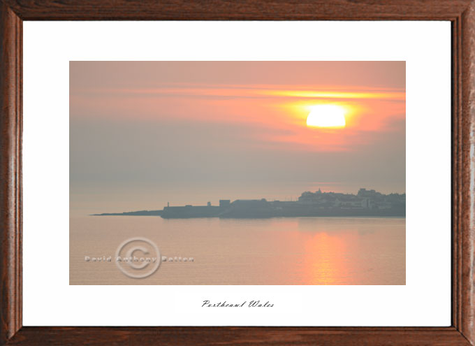 Sunset over Porthcawl Pier photo in wales UK