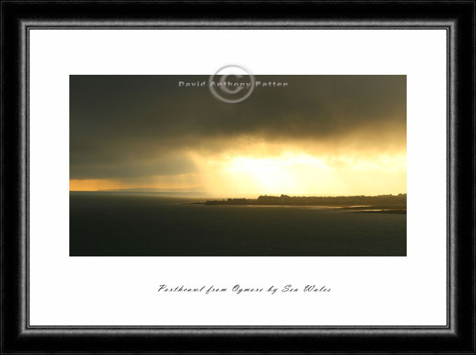 Stormy cloud sunburst over porthcawl like a turner painting