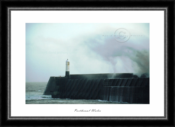 photo of wave breaking over porthcawl pier wales by david anthony batten